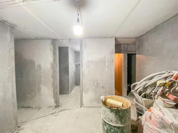 Механизированная штукатурка стен в квартире